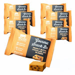 Eight PB chocolate chip blondie bars in orange packaging with clean, high-protein, gluten-free ingredients.