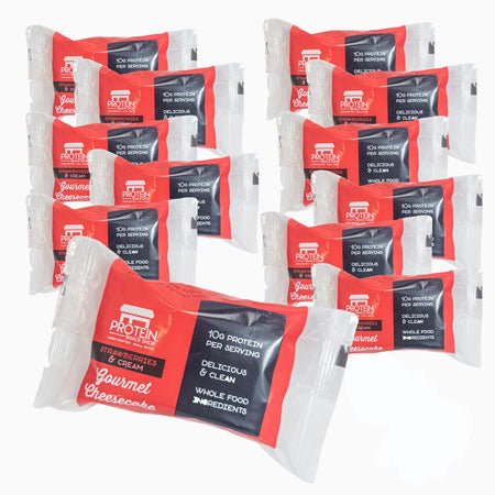 Twelve strawberry cheesecake bars in red packaging, made with clean, high-protein, gluten-free ingredients.