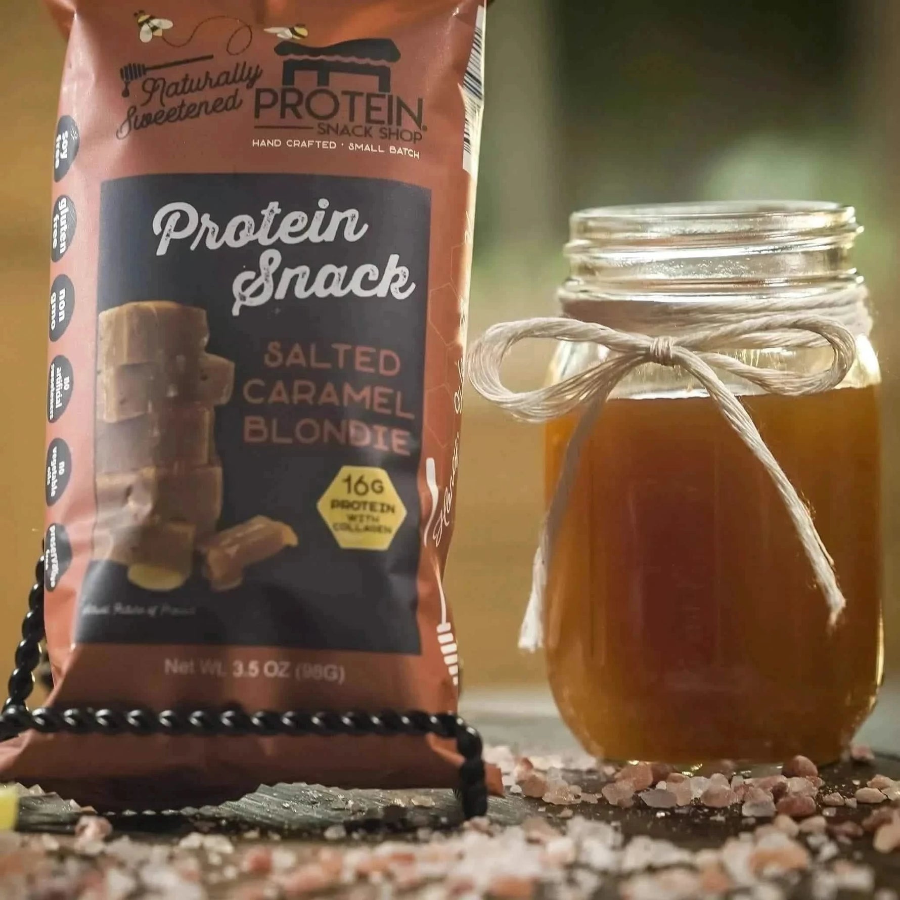 Front view package of gourmet honey-sweetened salted caramel blondie protein snack, 5-count, gluten-free and high-protein.