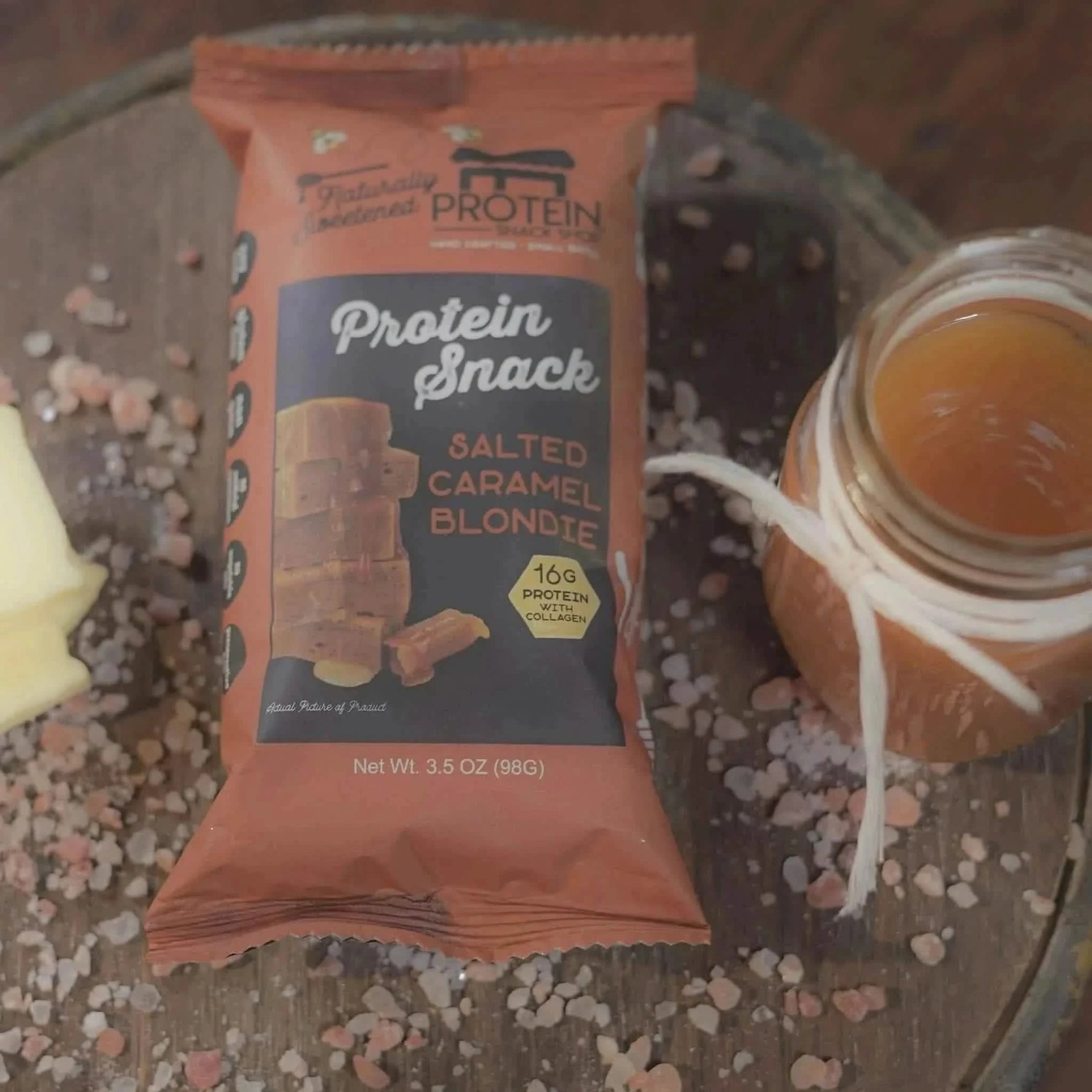 Top view package fourth of gourmet honey-sweetened salted caramel blondie protein snack, 5-count, gluten-free and high-protein.