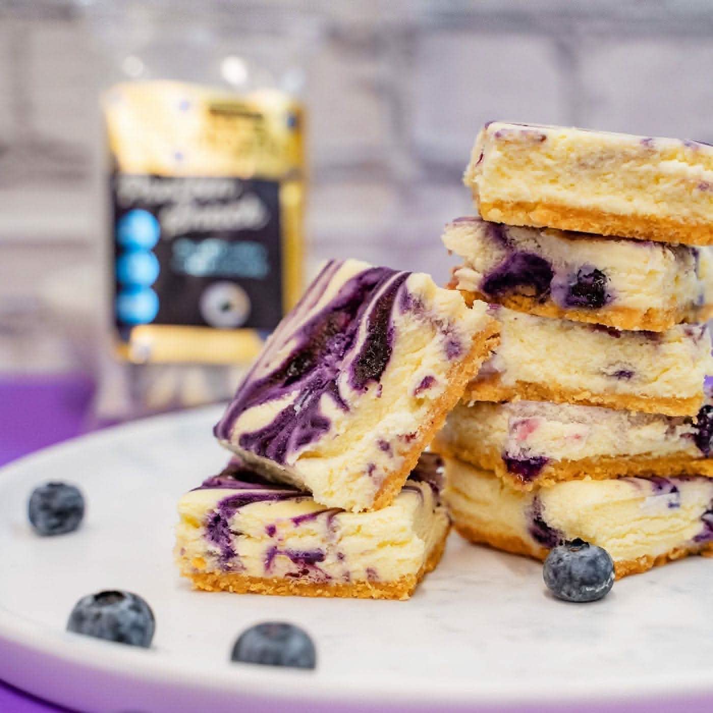 Raw picture of blueberry cheesecake protein snack, 5-count, gluten-free and keto-friendly.