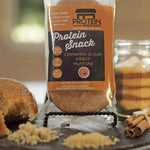 Front view package of gourmet low-carb cinnamon donut muffin protein snack, 5-count, gluten-free and keto-friendly.