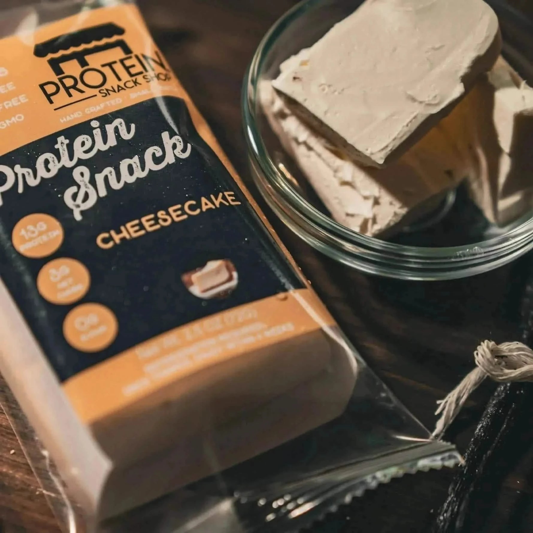Top view package second of original cheesecake protein snack, 5-count, gluten-free and keto-friendly.