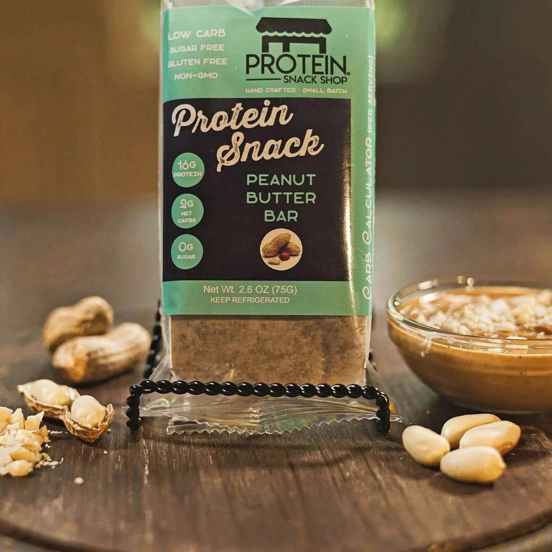 Front view package of gourmet low-carb peanut butter bar protein snack, 5-count, gluten-free and keto-friendly.