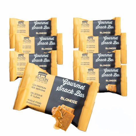 Eight gluten-free, high-protein Blondie Bars from Protein Snack Shop arranged together in clean, honey-sweetened packaging.